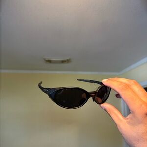 Men's Black Oval Performance Sunglasses Oakley Oakleys